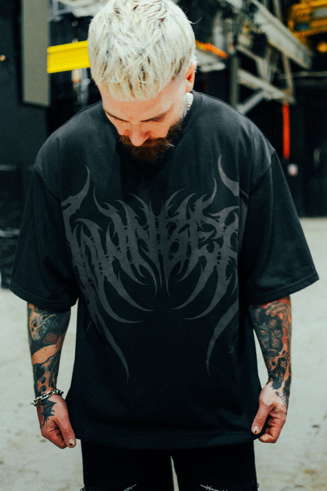 NONE HEAVIER TEE
